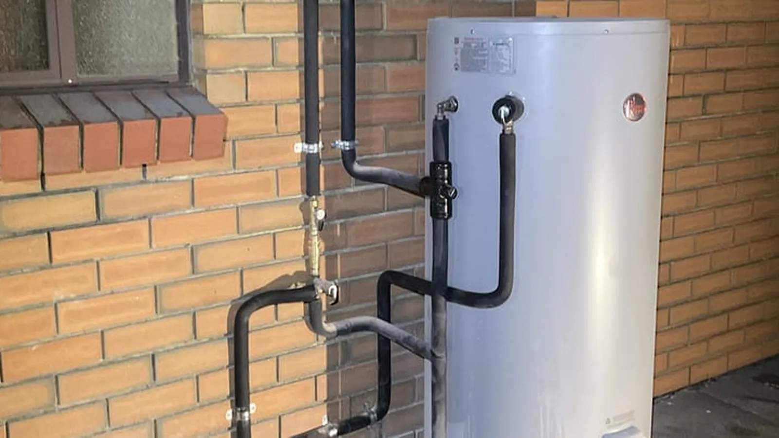 Rheem hot water system with tempering valve and pipework installed
