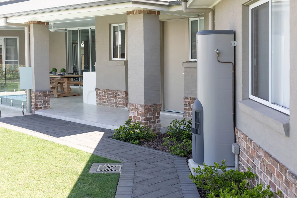 Heat pump hot water system installed outside a modern Adelaide home